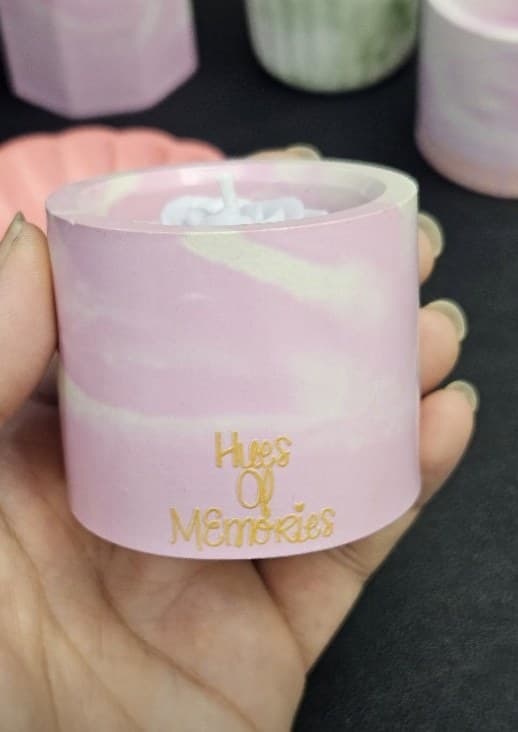 Pink marbled jar candle with gold Hues of Memories lettering